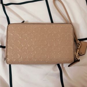 - coach wristlet